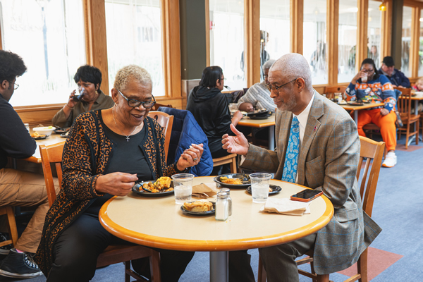 Faculty and staff enjoying a meal
